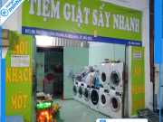 Bảng hiệu tiệm giặt sấy ủi